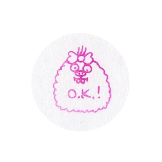 A circular stamp image featuring a pink line-art illustration of a fluffy character with flowers in its hair and the text o.k.!