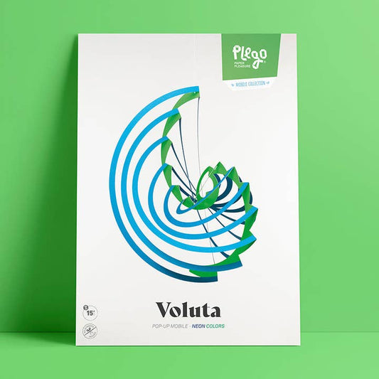 A product box for the Plego Voluta pop-up mobile by Plego, featuring a white background with a blue and green spiral graphic, set against a solid green background.