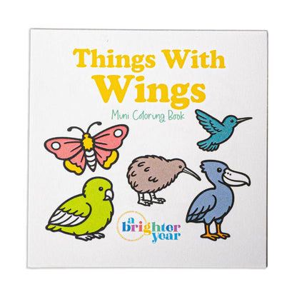Cover of "Things with Wings" mini coloring book with colored drawings of a butterfly, hummingbird, parrot, kiwi, and shoebill stork