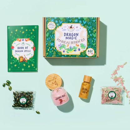 Contents and retail packaging of the Dragon Magic Potion Kit showing