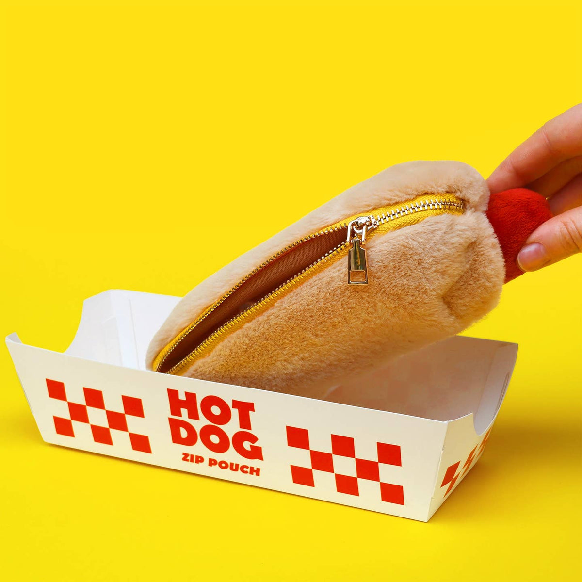 Plush hot dog pen case shown with open zipper