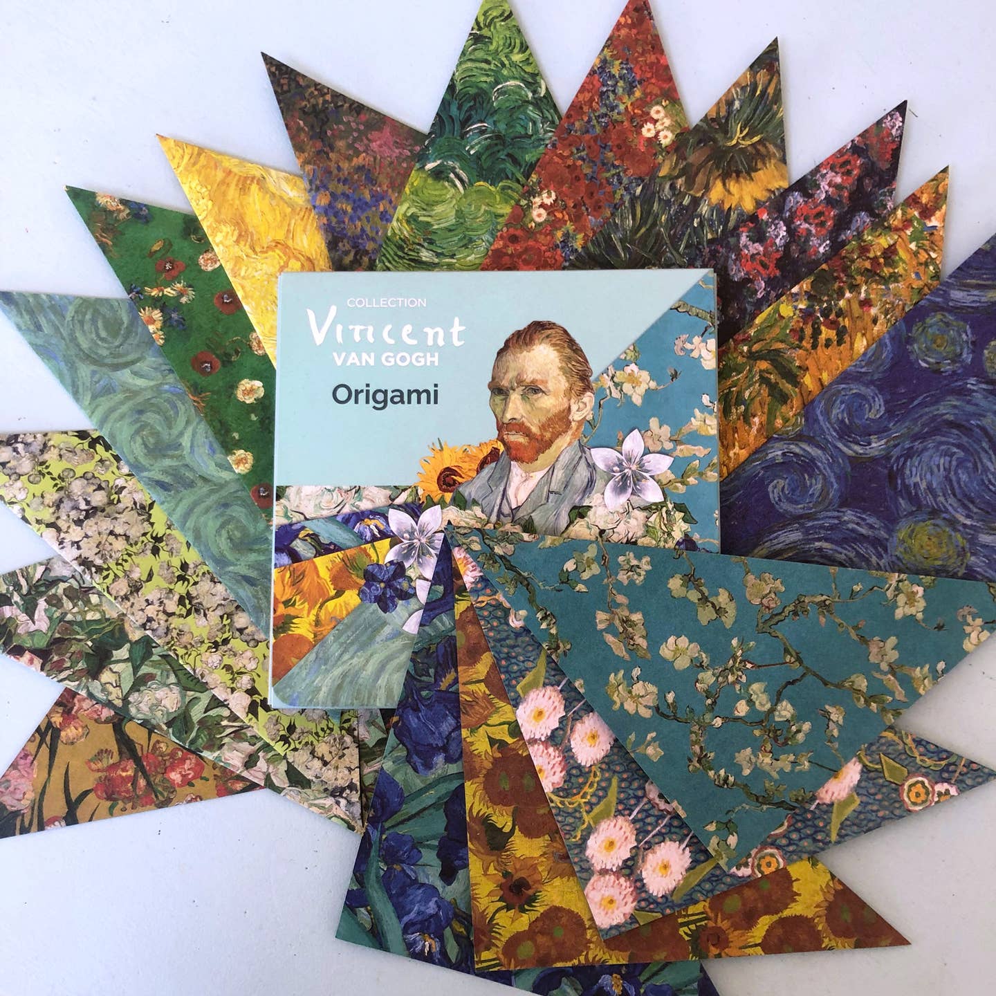 a selection of richly colored floral origami papers featuring Van Gogh's florals