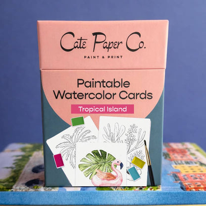 Cate Paper Co. paintable watercolor cards packaging with tropical island design on a blue background