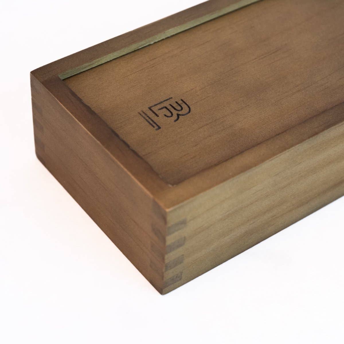 Detail of Blackwing logo stamped into top of the Rustic Blackwing Box Set
