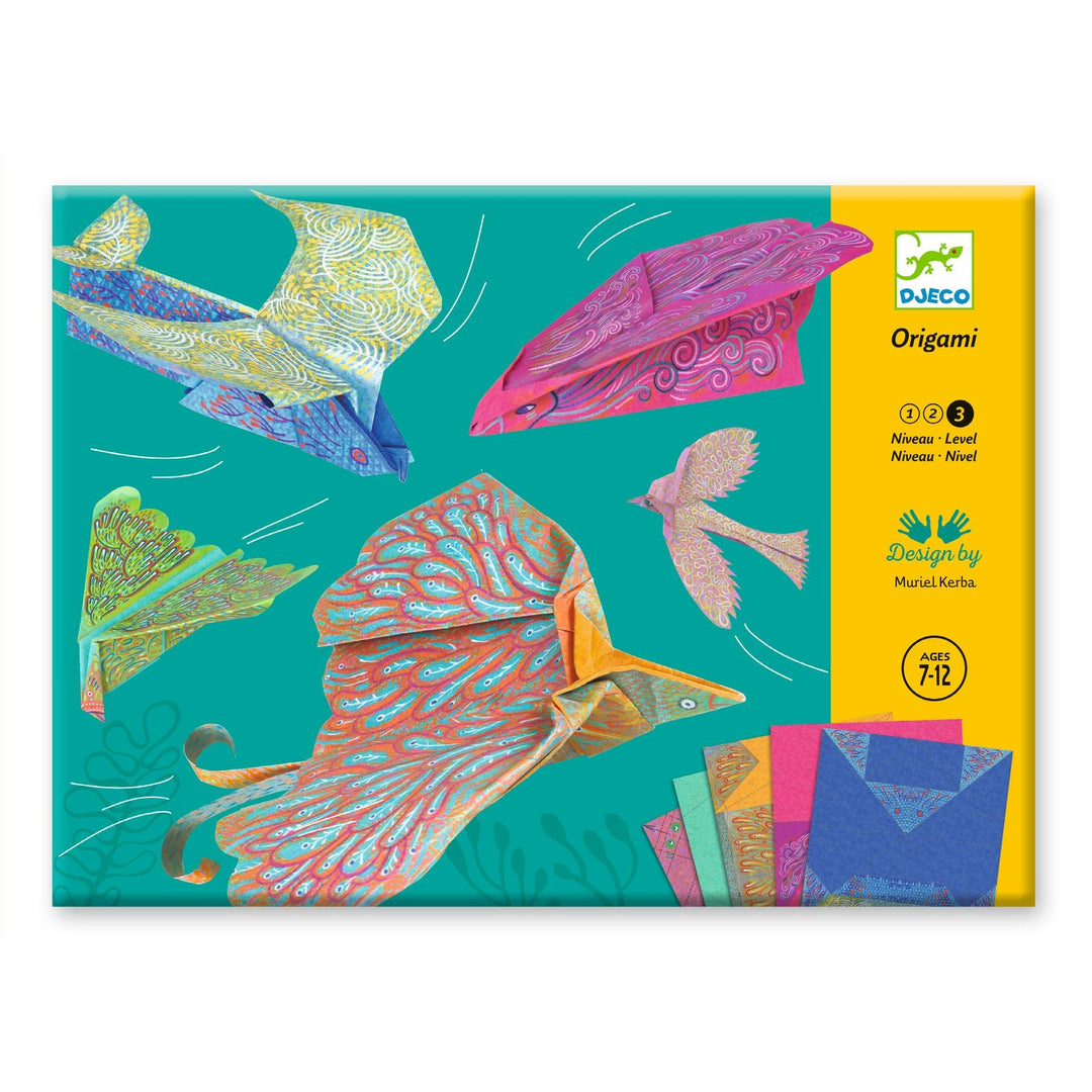 a green and yellow package of origami papers with five completed origami birds in blue, pink, peach, orange, and green
