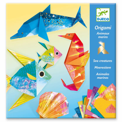 a yellow and blue package of origami papers showing completed origami figures of seahorse, dolphin, fish, and seashells in a variety of colors