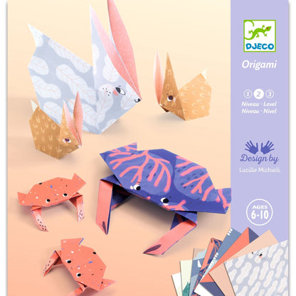 pastel purple and peach package showing an origami adult bunny with two baby bunnies, and an adult crab with two baby crabs