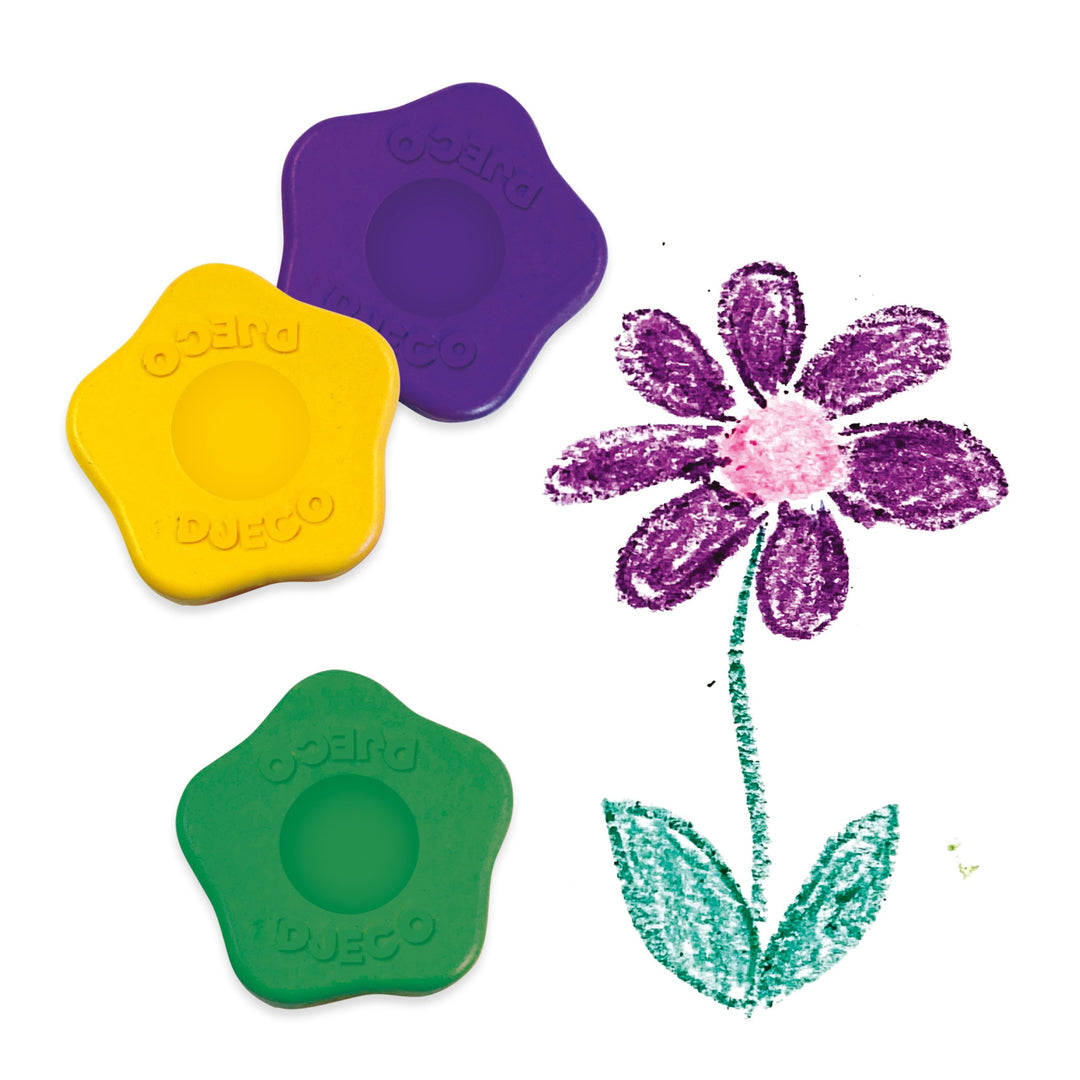 purple, yellow, and green flower shaped crayons next to a crayon drawing of a purple and pink flower with green leaves on a white background