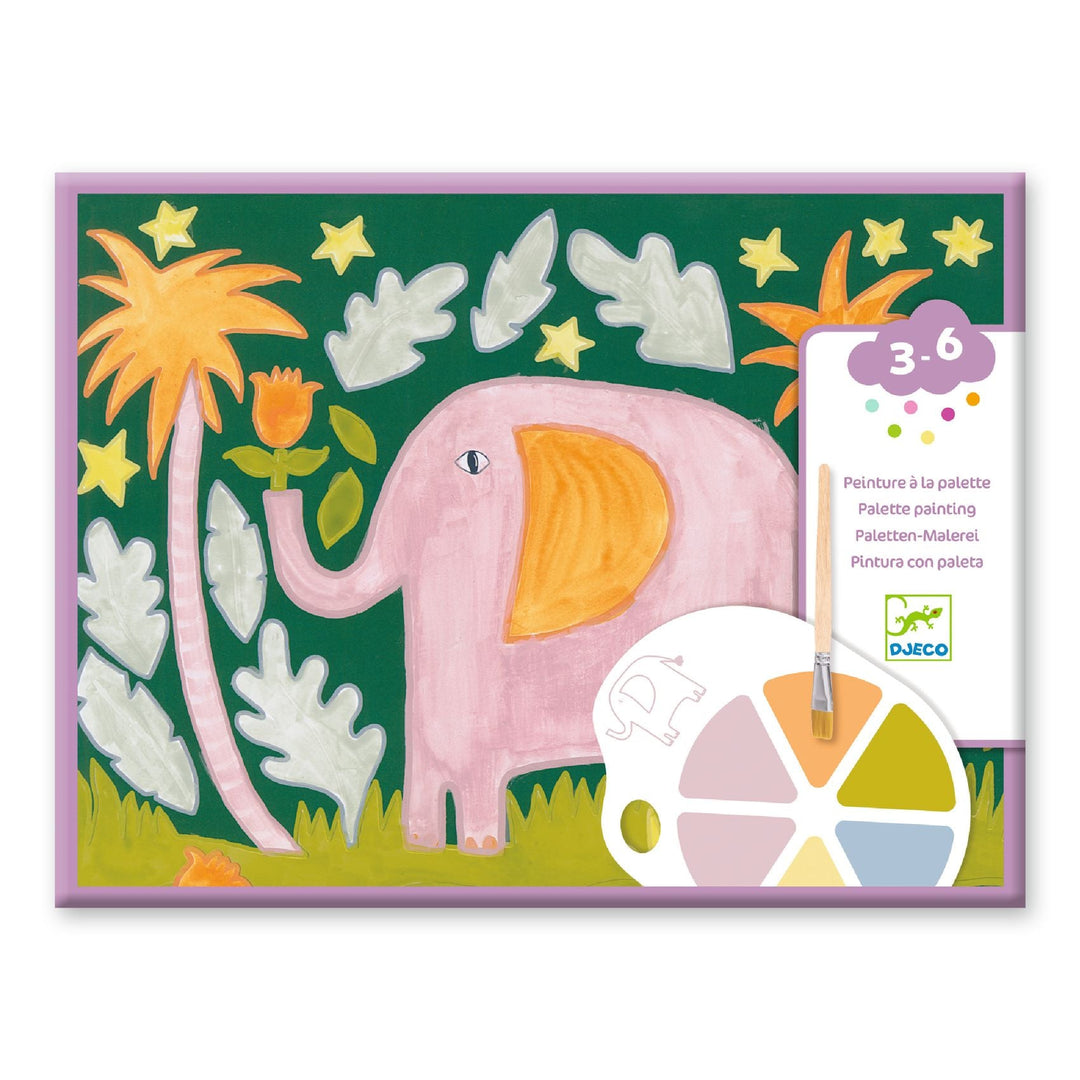 packaging showing a completed elephant painting featuring a pink elephant with yellow ears, against a backdrop of green and fold foliage. Also pictured is a cardboard paint palette with areas of solid paint and a paint brush