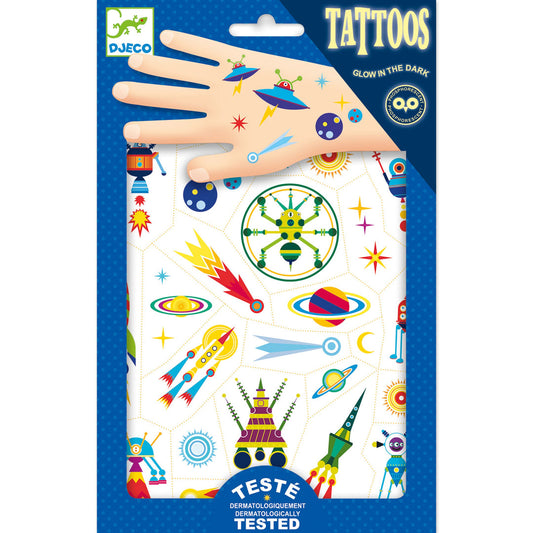 blue package of temporary tattoos showing a variety of space themed tattoos, like rockets and alien ships, on a cartoon hand