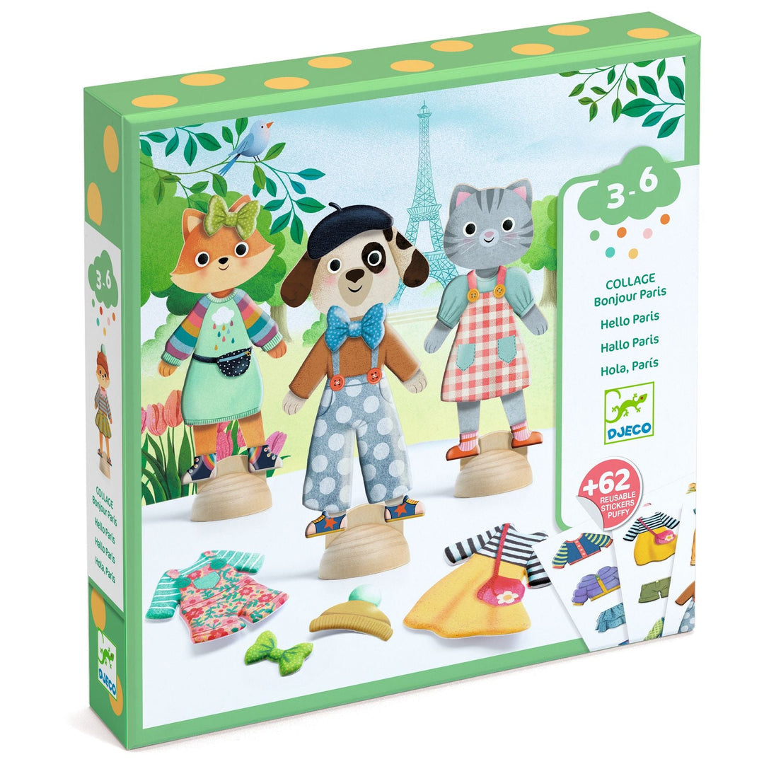 Green box featuring fox, dog, and cat figurines wearing chic outfits, with clothes at their feet, standing in front of the Eiffel Tower