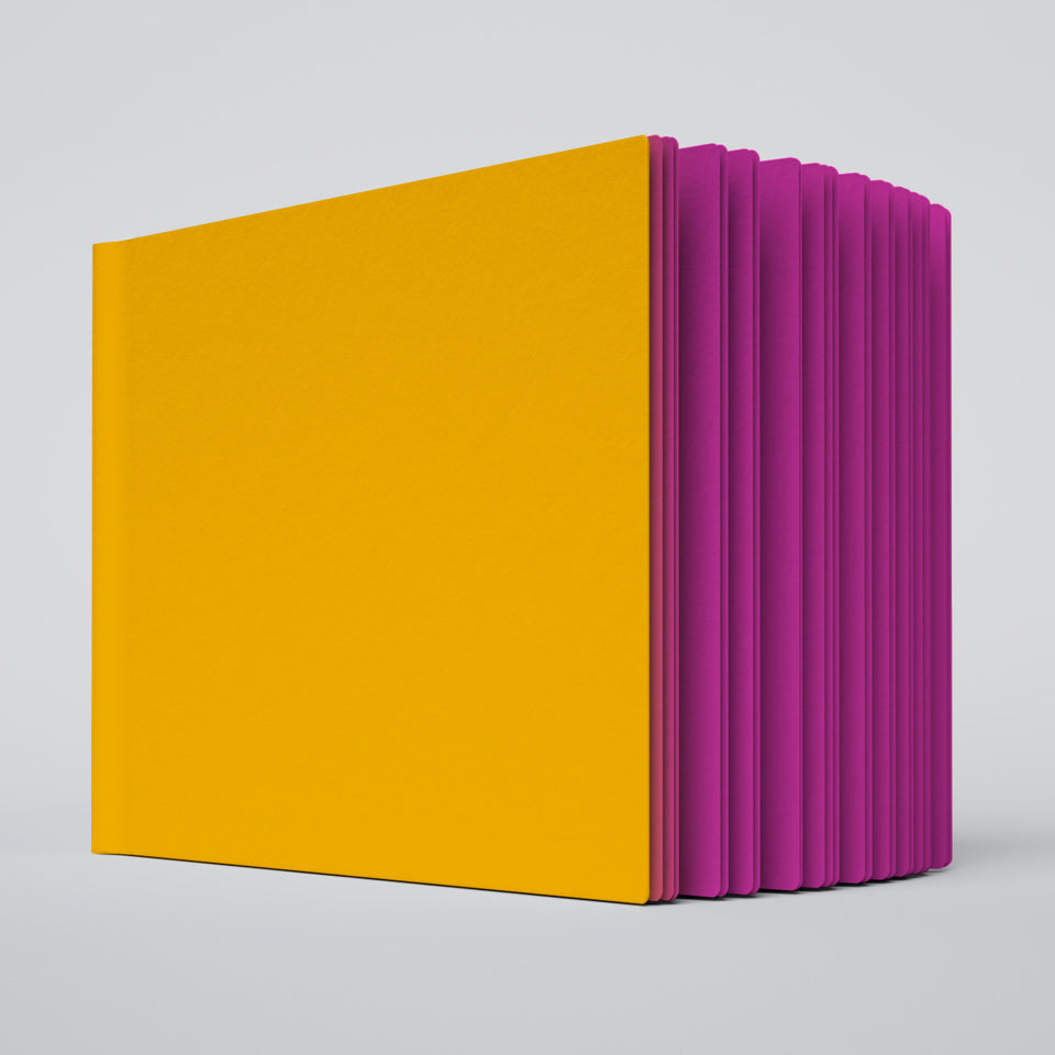 Uglybook in No 2 Lunchbox with a schoolbus yellow cover and magenta pages