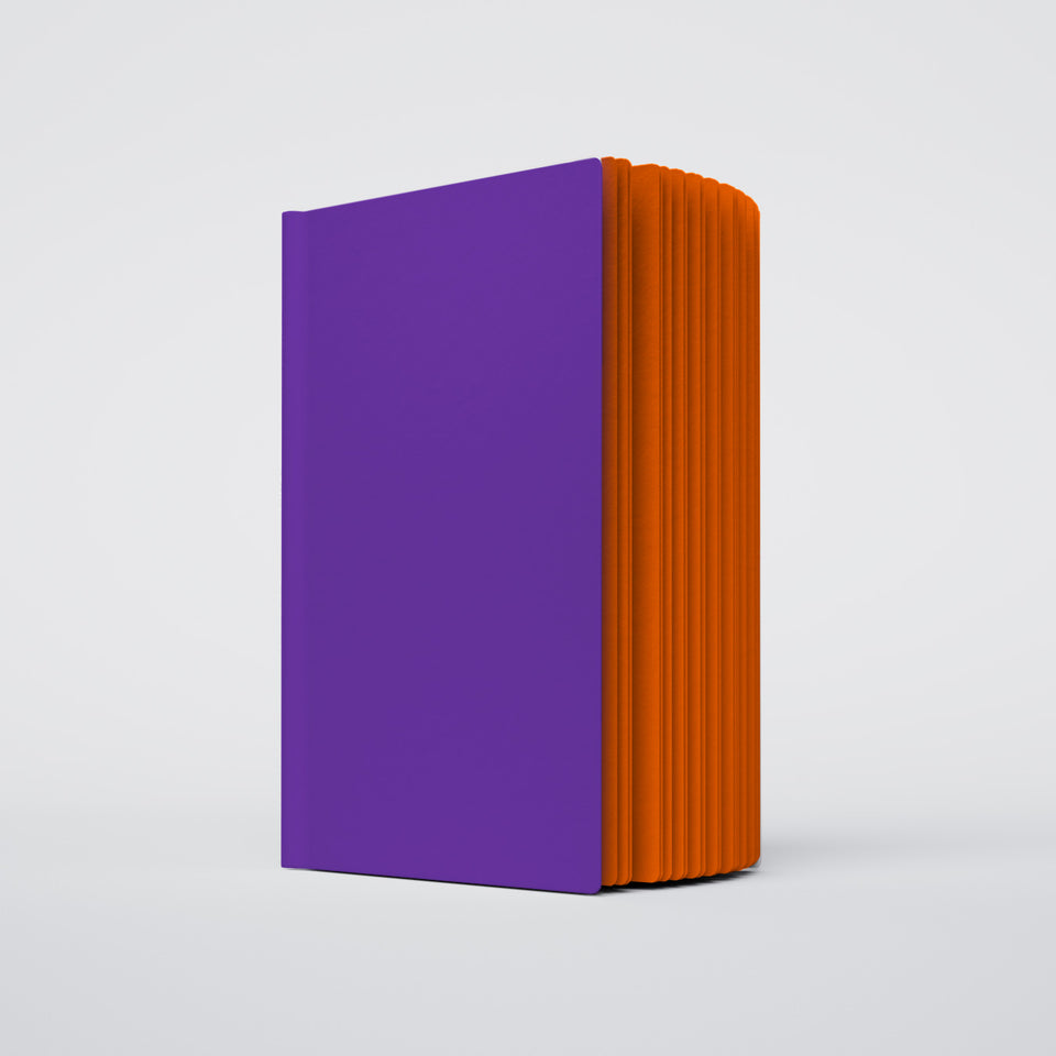 partially opened ugly book with a purple cover and orange interior pages