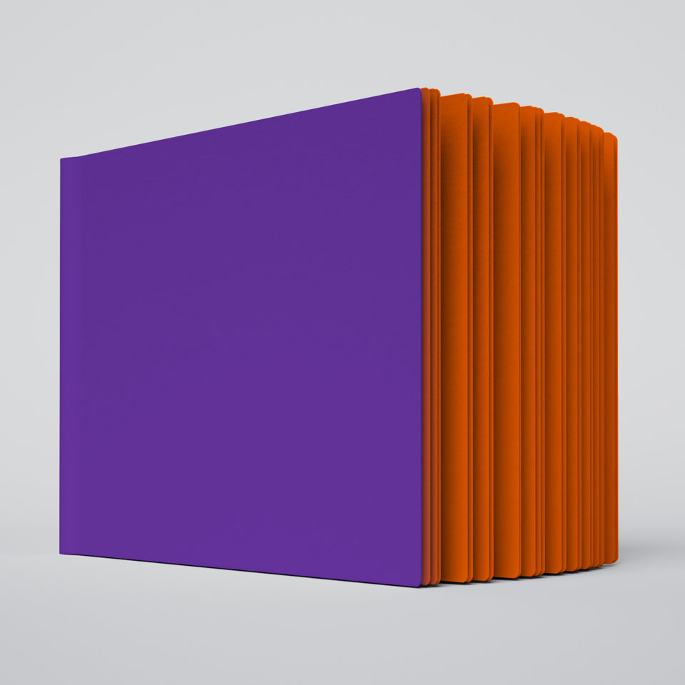 partially open ugly book with purple cover and orange interior pages