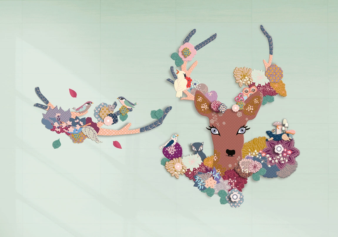 An  example of the assembled Flowered Doe craft kit placed on a mint green wall