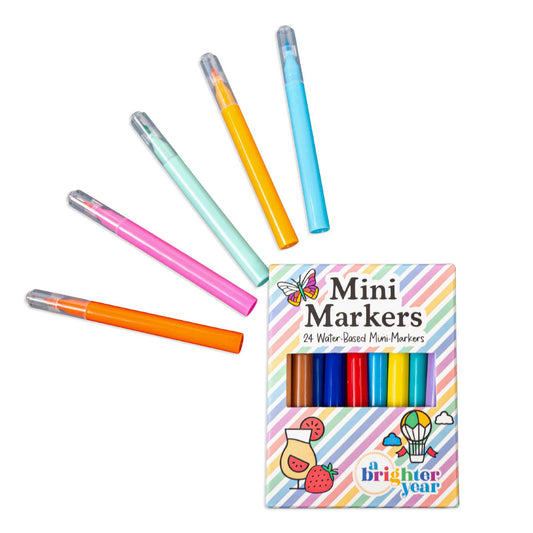 Colorful rainbow striped packaging with black text which reads, "Mini Markers: 24 Water Based Mini Markers by a Brighter Year" with images of a hot air balloon, a beverage with strawberries, and a butterfly. Five markers in orange, pink, green, yellow, and blue sit on a white background.